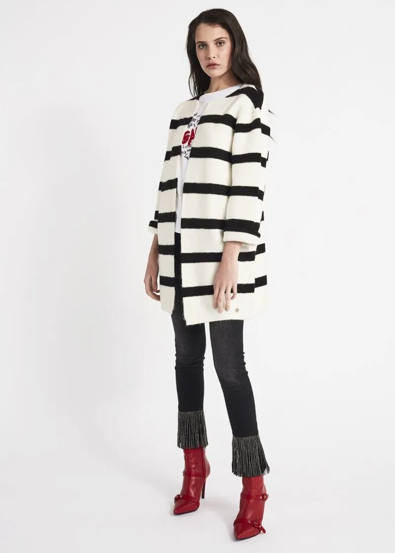 Jeans skinny con frange al fondo