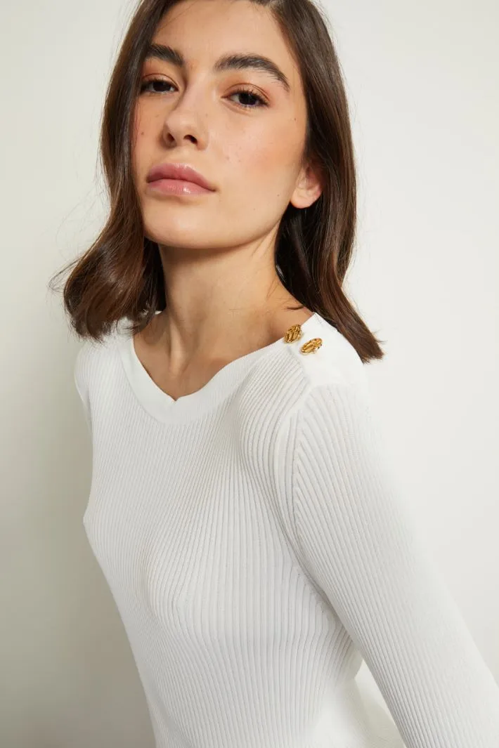 Maglia con bottoni decorativi