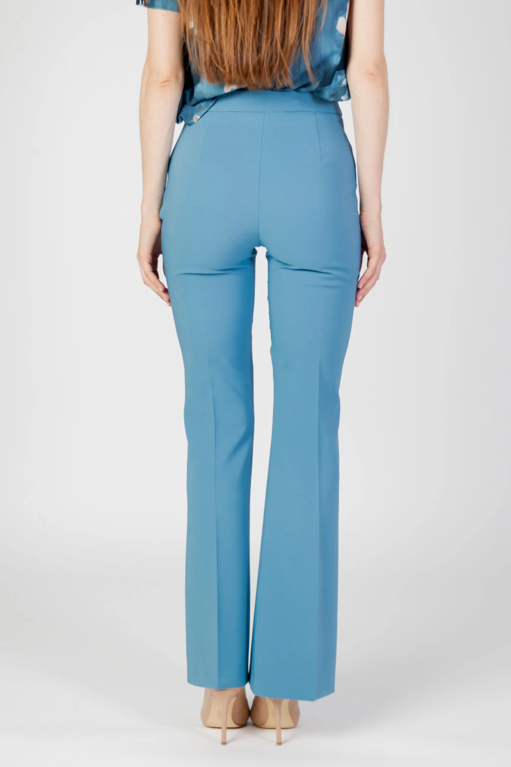 Pantaloni bootcut Rinascimento rewi  zampa Turchese