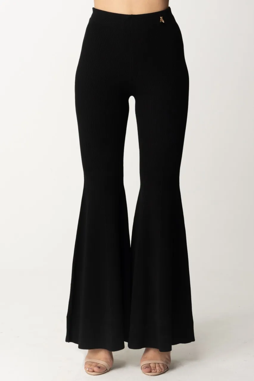 Pantaloni in maglia a zampa con Fly charm Nero