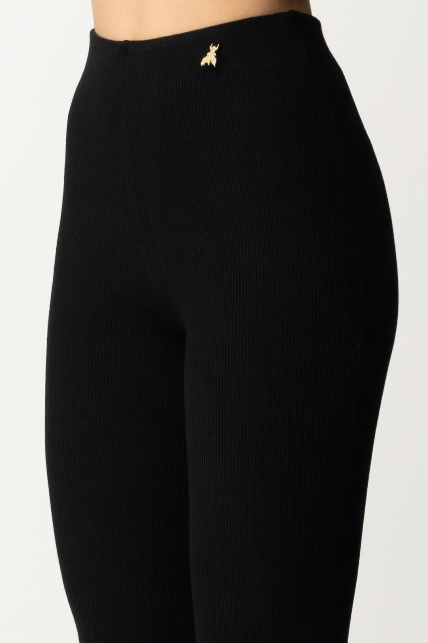 Pantaloni in maglia a zampa con Fly charm Nero
