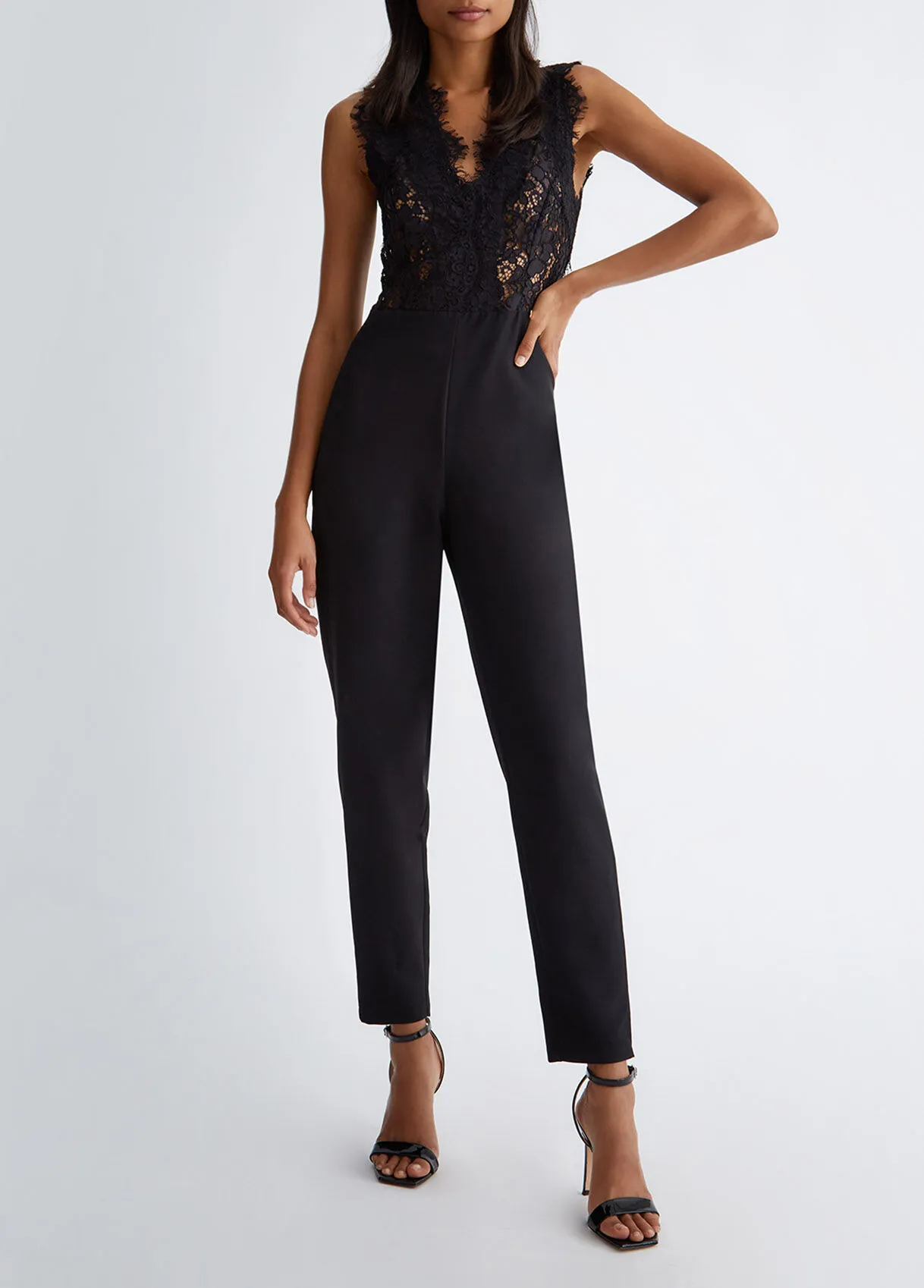 Tuta donna elegante nera in pizzo 